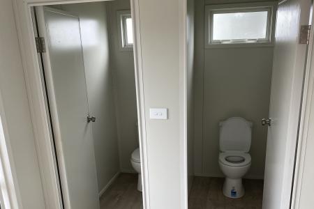 Toilet and shower block