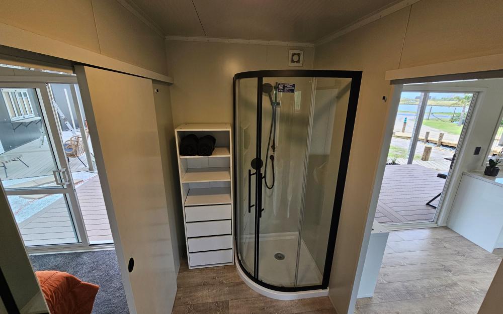 shower and storage in the huge bathroom